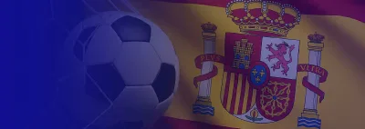 Cabecera alargada con un balón junto a la bandera española ondeando.